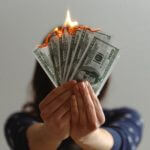 Burning money, as a representation of what inflation is